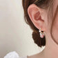 Aretes colgantes de diamantes brillantes